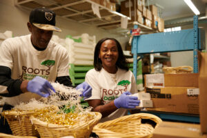 two smiling kitchen workers